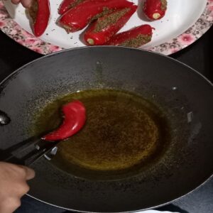 Dip Chilies in Oil